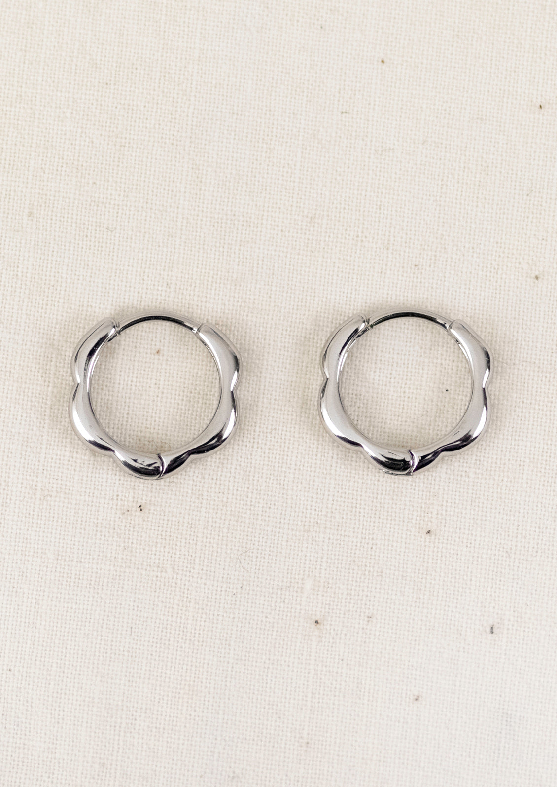 Fashionable hoop earrings in gold and silver